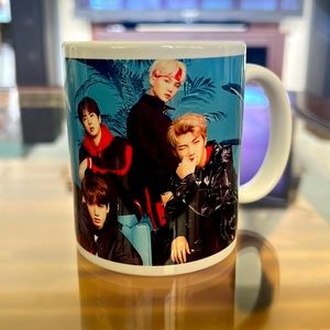 Sip your favorite drink in style with this K-pop theme BTS mug featuring members